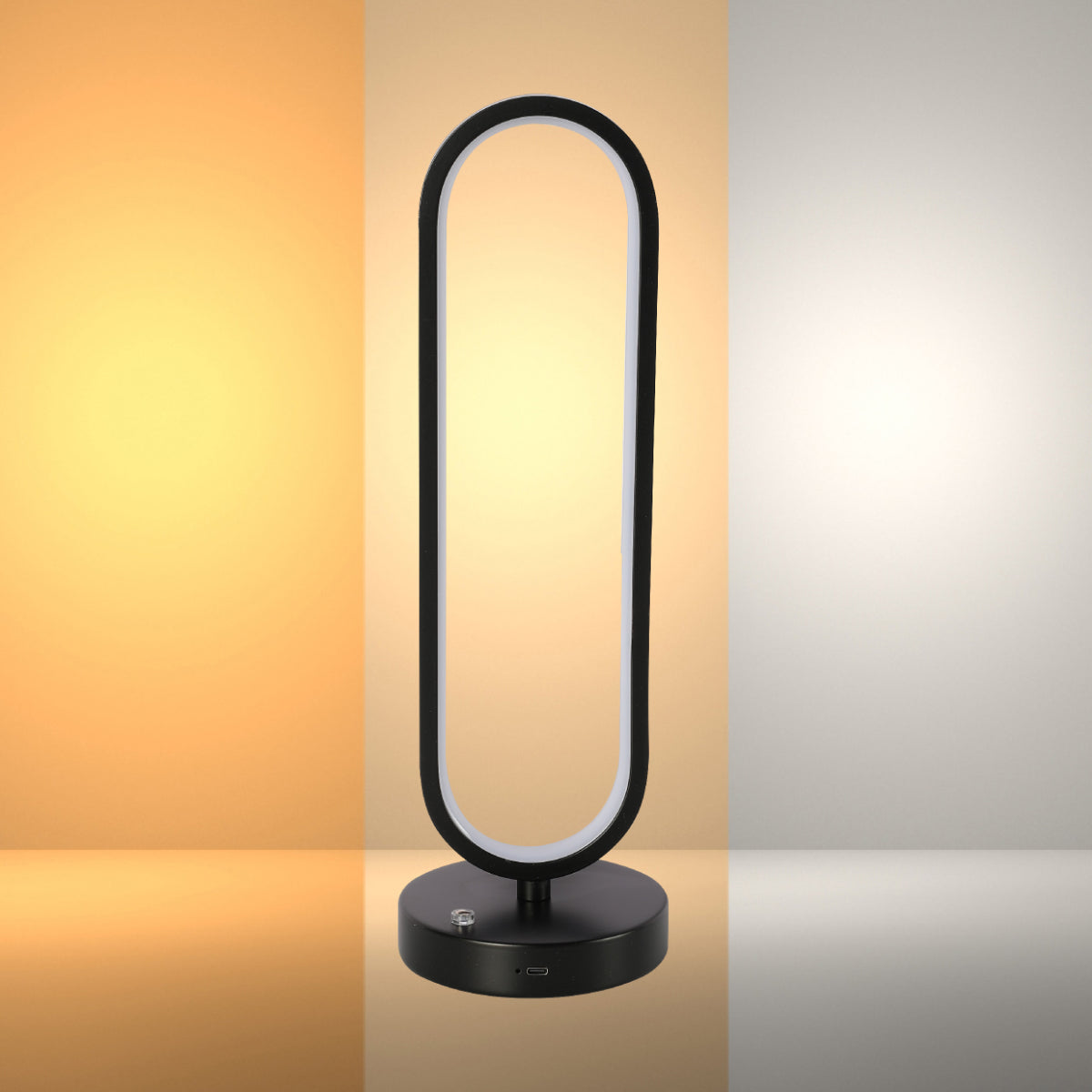 Lámpara de mesa ovalada minimalista con acabado negro, ideal para oficinas modernas y espacios de trabajo elegantes.