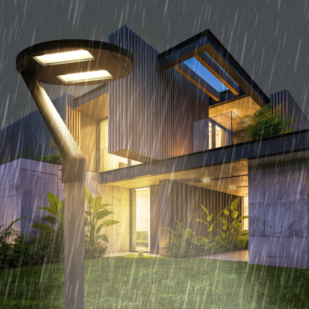 Lámpara de jardín LED de 60W, ideal para iluminar senderos en exteriores con estilo moderno y funcional.