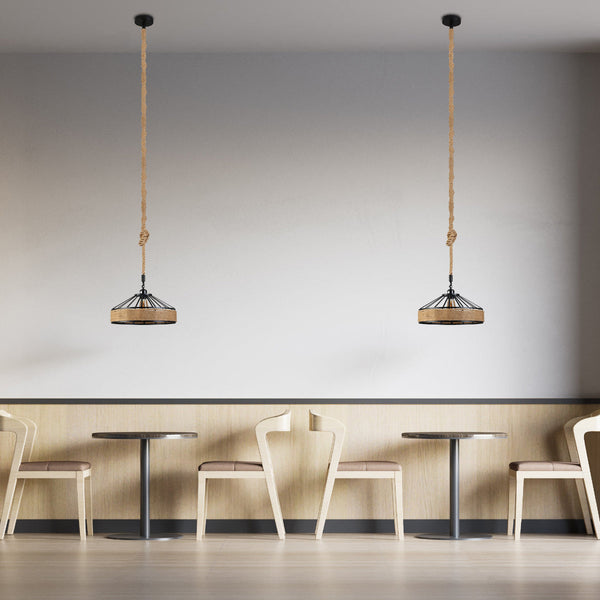 Imagen de una lámpara colgante de metal negro y cuerda de yute, perfecta para iluminar cafeterías con estilo industrial.