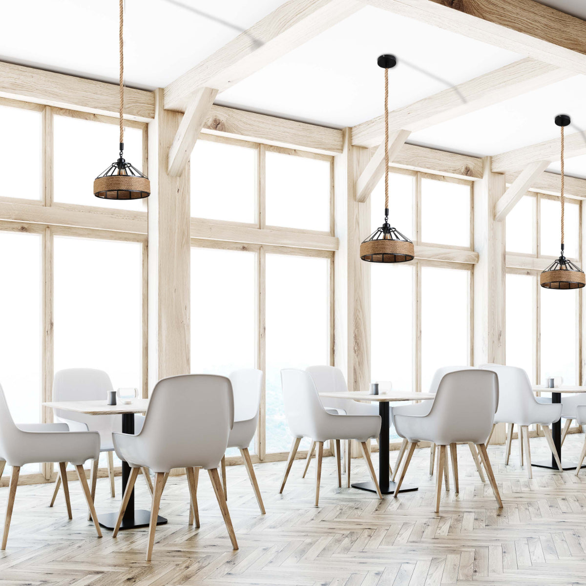 Pendiente de jaula de metal negro y cuerda de yute, ideal para comedores de estilo industrial.