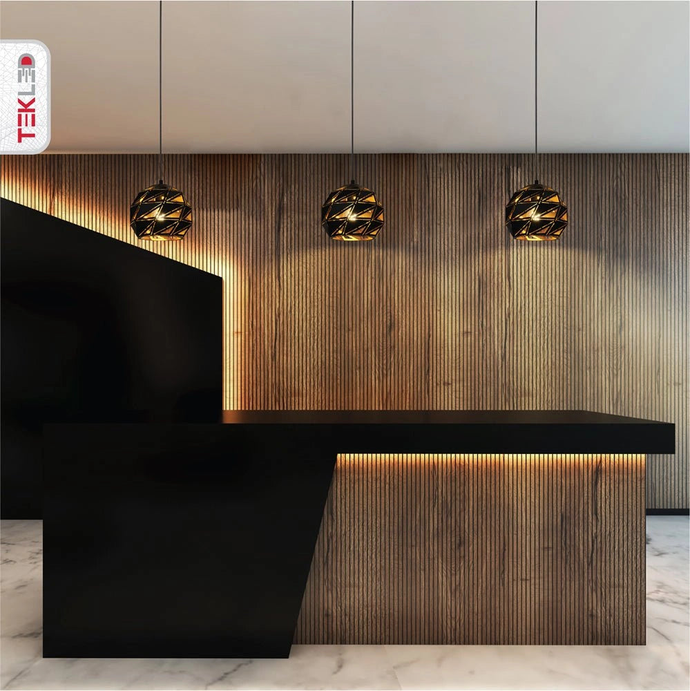 Black-golden metal polyhedral pendant light s with e27 fitting in an indoor setting triple usage