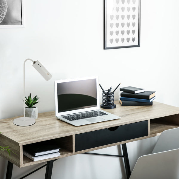 Lámpara LED clip montada en un escritorio moderno, ideal para oficinas o espacios de trabajo eficientes y elegantes.