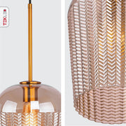 Detailed photo of amber glass schoolhouse pendant light with e27 fitting