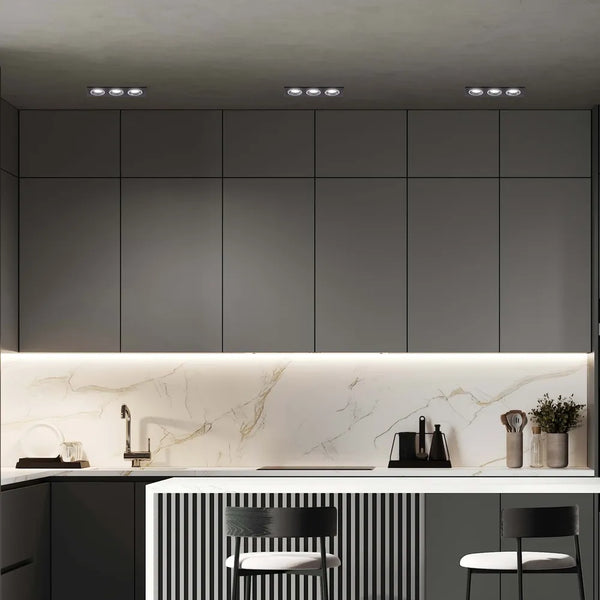 Moderno accesorio de downlight GU10 en una elegante sala de estar, mejorando la decoración contemporánea con su diseño empotrado y elegante.143-03404