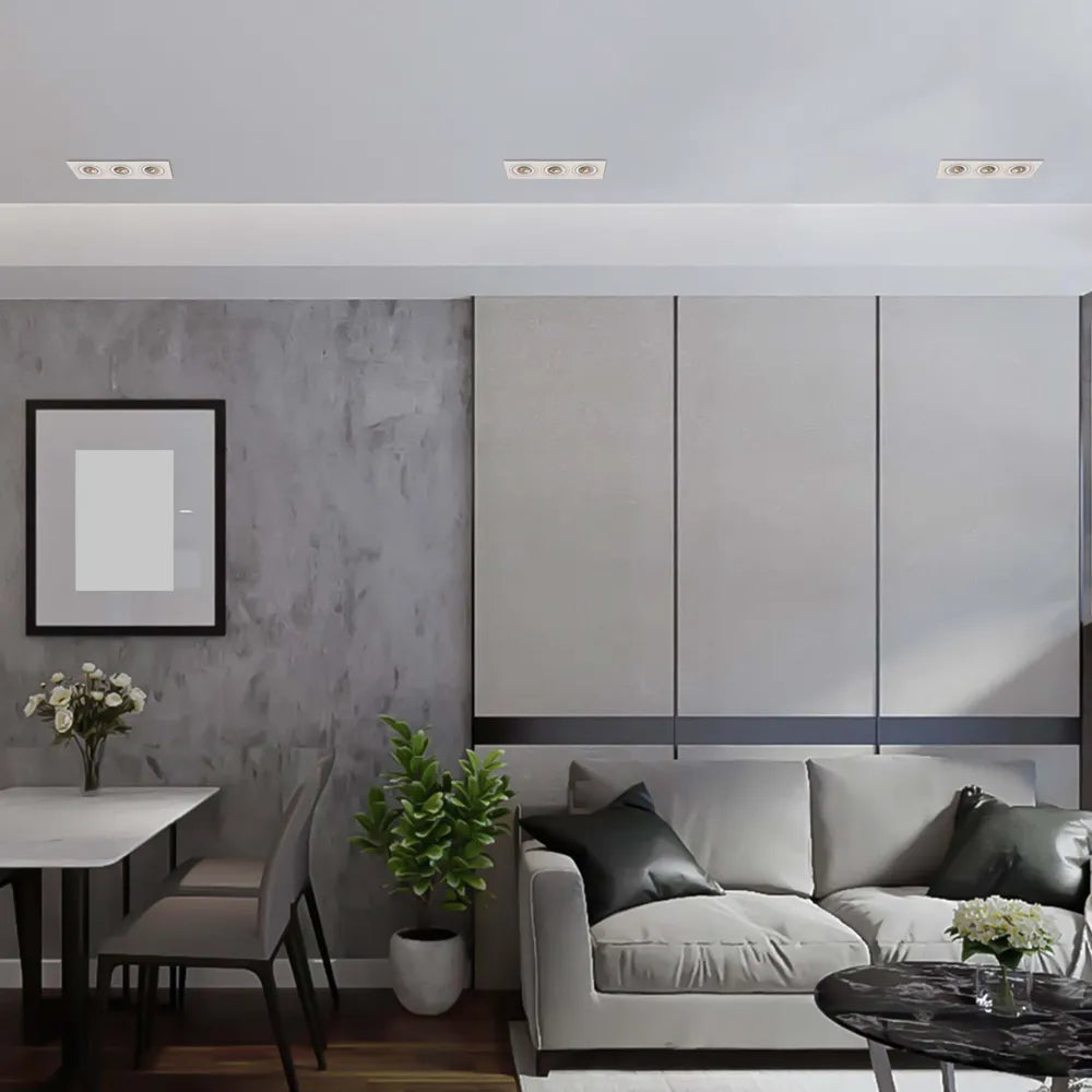 Moderno aparato de iluminación empotrado GU10 que ilumina una sala de estar elegante y contemporánea con una decoración minimalista y un ambiente cálido y acogedor.143-03405