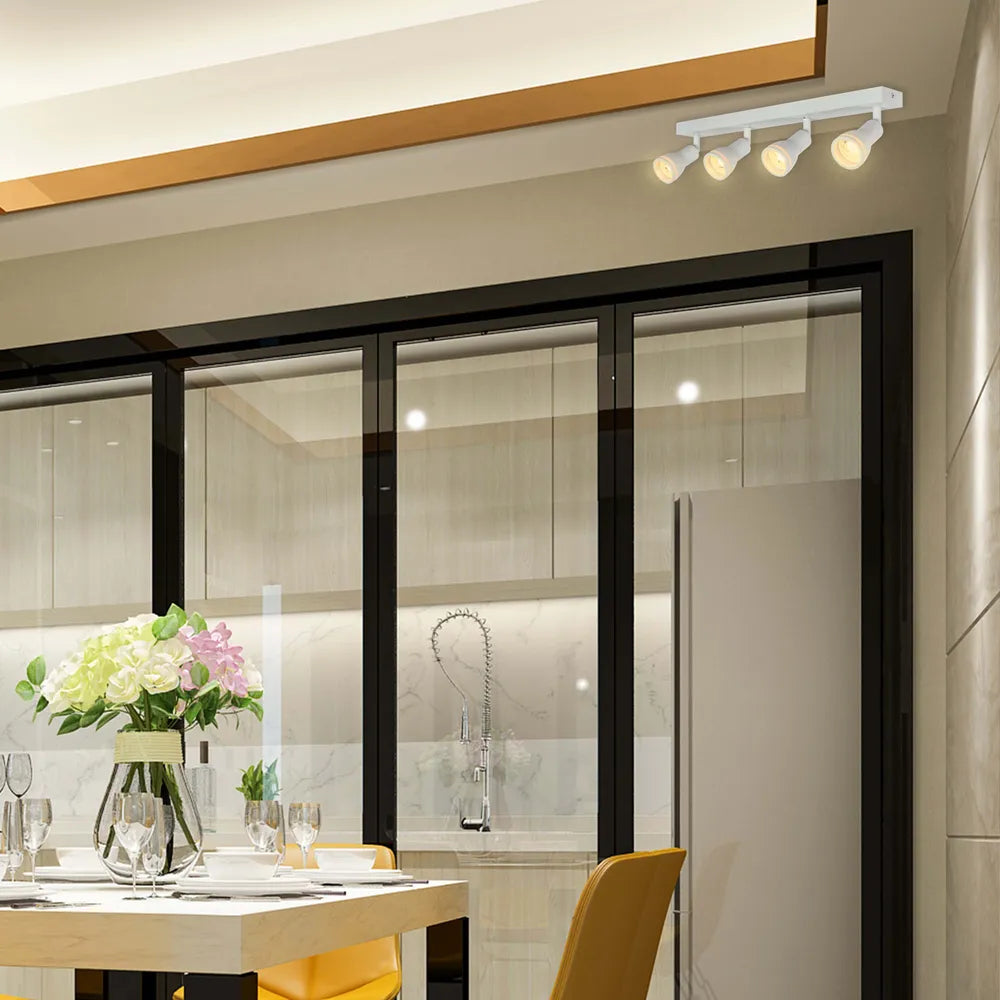 Moderno accesorio de foco Luma Cylindro GU10 que ilumina una sala de estar elegante con decoración contemporánea y ambiente cálido.172-03222