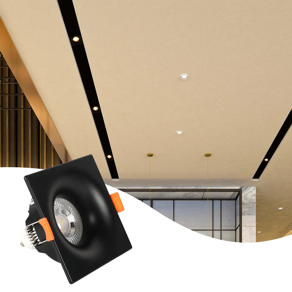 La luminaria empotrada GU10 de diseño elegante ofrece una iluminación moderna en una sala de estar contemporánea, mejorando la decoración minimalista con un toque de estilo.143-03994