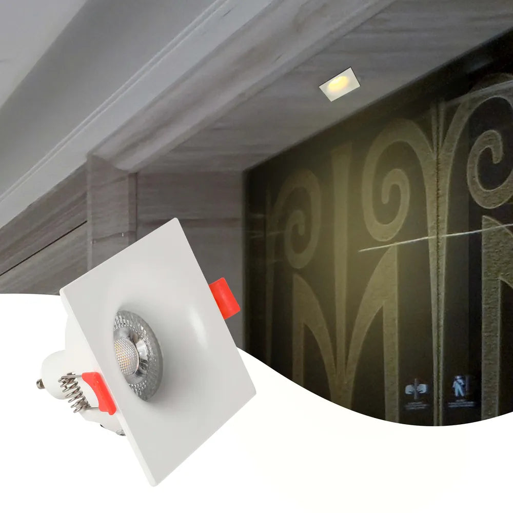 Luminaria empotrable GU10 elegante que mejora una sala de estar moderna con una decoración minimalista, proporcionando iluminación focalizada y una estética limpia.143-03995