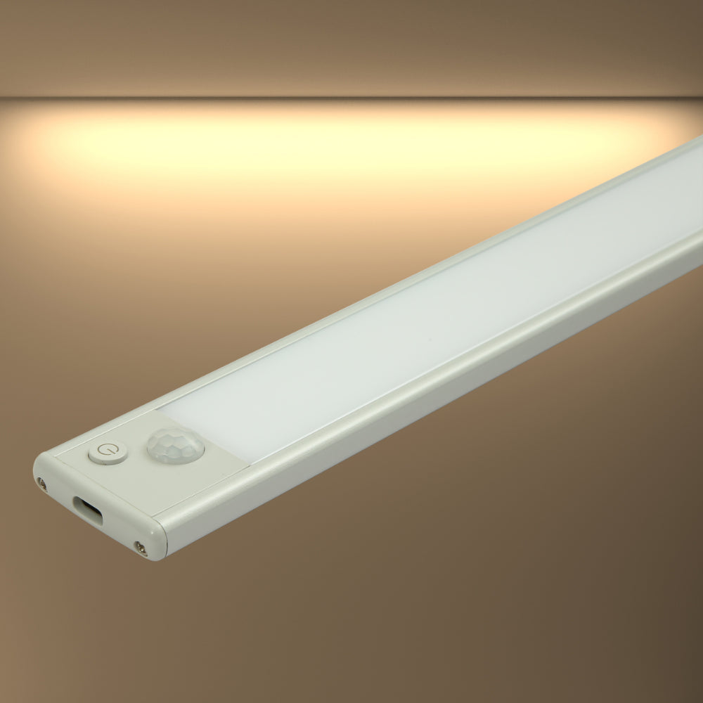 Luz LED de gabinete con sensor de movimiento, ideal para cocinas modernas y armarios. Batería recargable y diseño elegante.