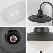 Lámpara de pared exterior en gris oscuro, perfecta para entradas con estilo contemporáneo y decoración moderna.