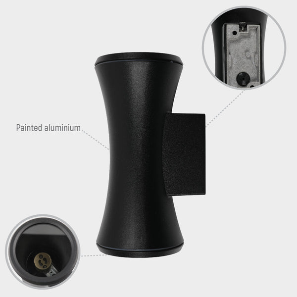 Imagen de detalle de luz de pared exterior de aluminio en forma de reloj de arena, ideal para espacios al aire libre con estilo moderno.