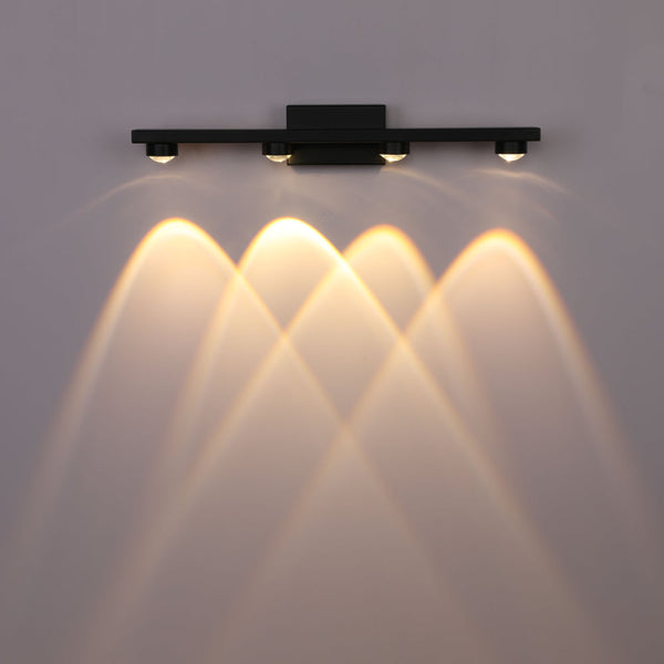 Luz de pared LED en espejo nórdico negro, ideal para baños modernos, combinando estilo y funcionalidad.