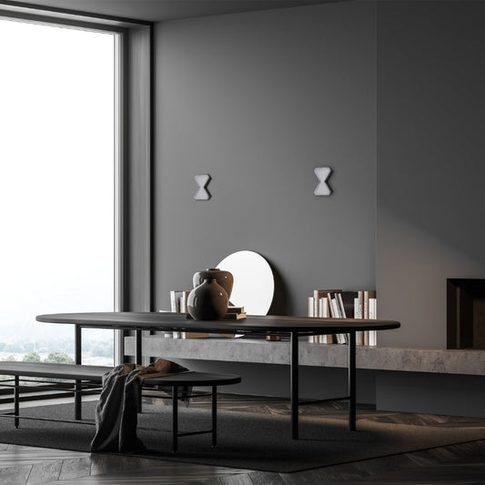 Luz de pared LED moderna en forma de reloj de arena, perfecta para salones con decoración contemporánea y elegante.