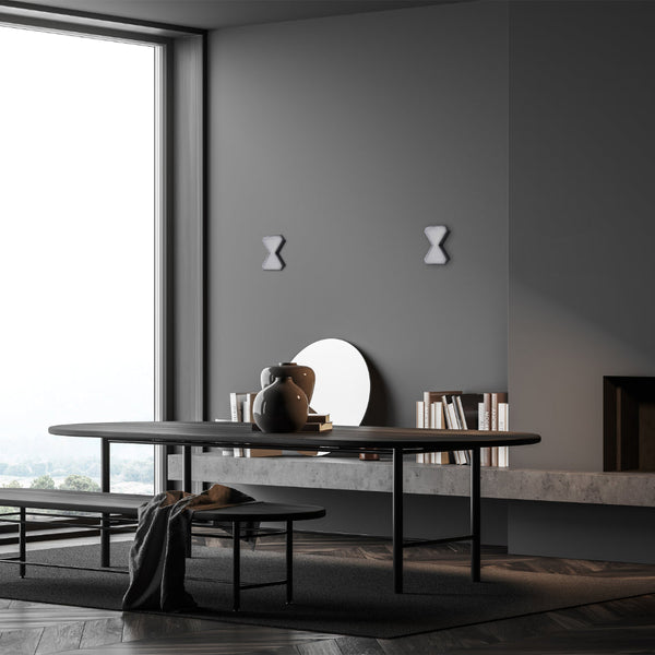 Luz de pared LED moderna en forma de reloj de arena, perfecta para salones con decoración contemporánea y elegante.