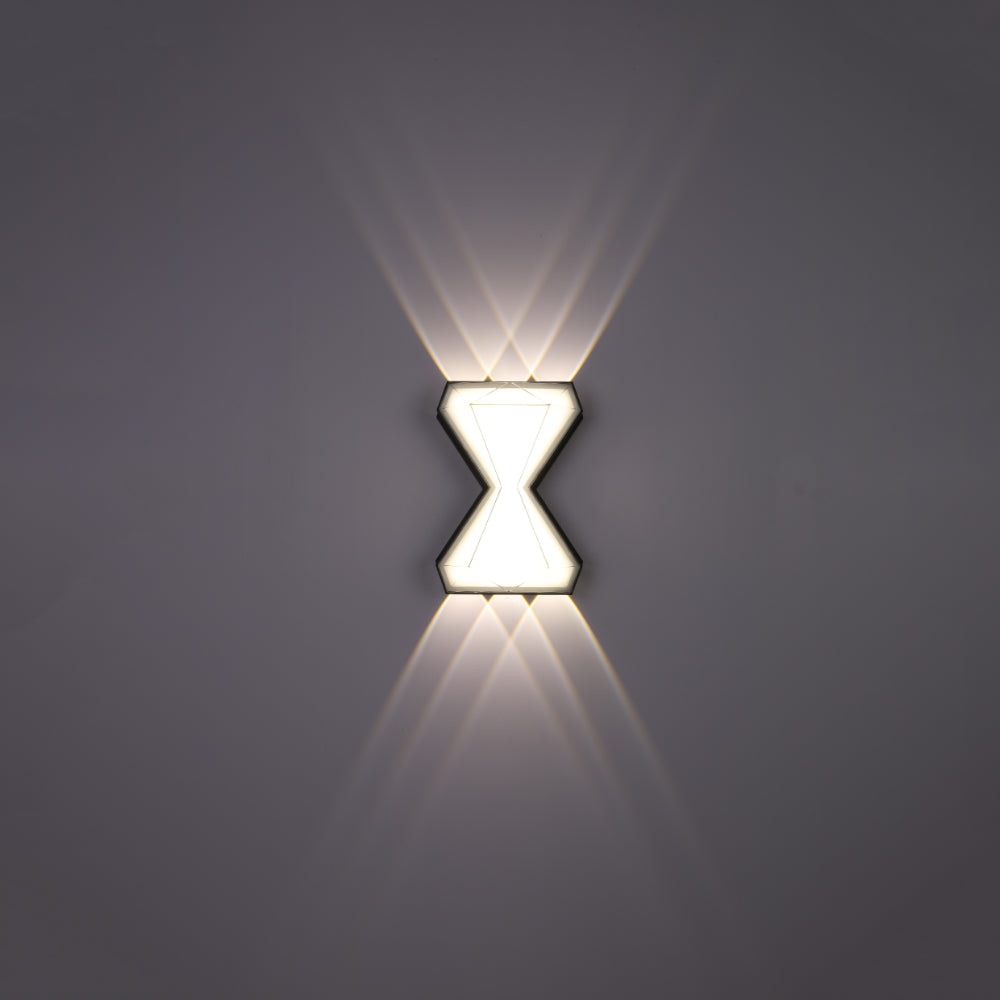 Luz de pared LED moderna en forma de reloj de arena, ideal para salas contemporáneas y estilos decorativos minimalistas.