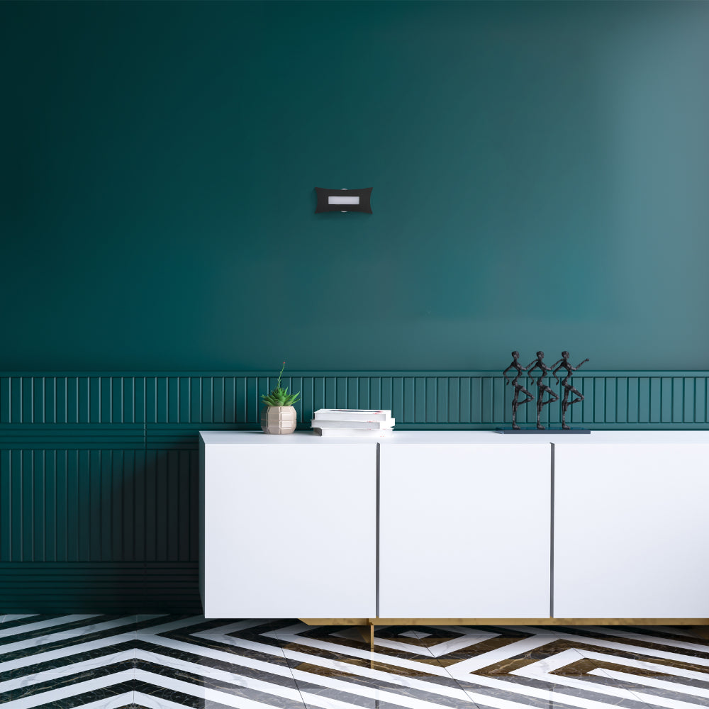 Luz de pared LED moderna en negro, ideal para salones y oficinas con decoración contemporánea. Perfecta para iluminación ascendente y descendente.
