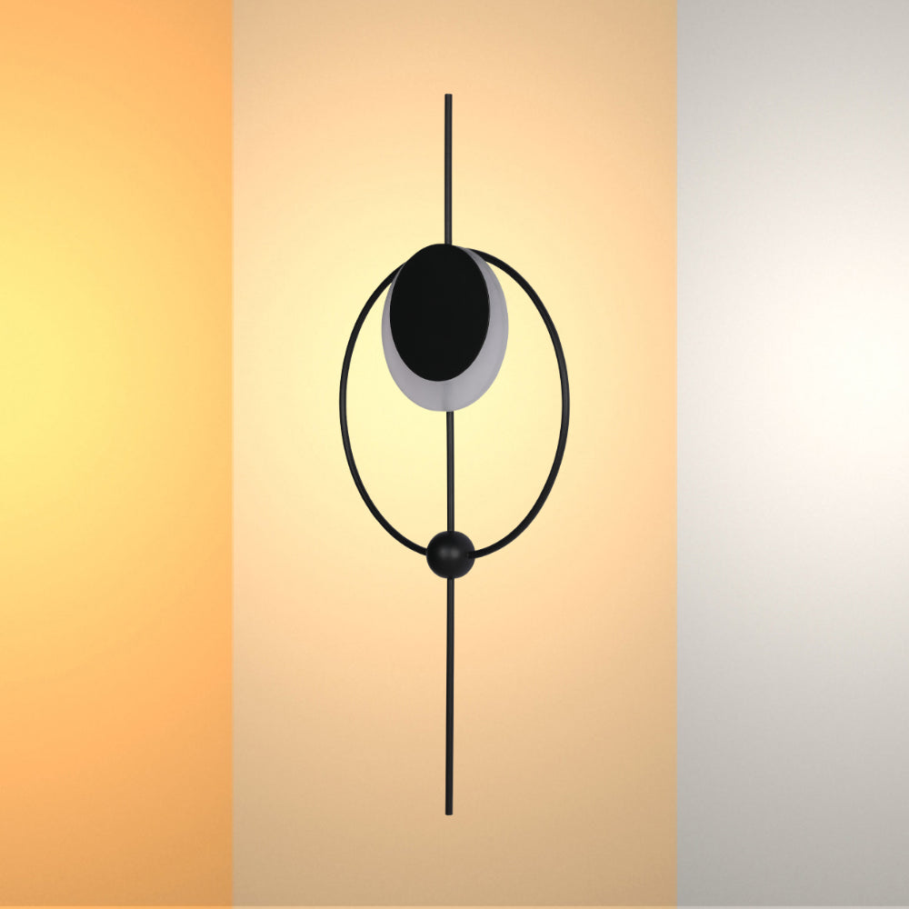 Luz de pared LED moderna en forma de luna geométrica, perfecta para decorar espacios contemporáneos como salas de estar o estudios.