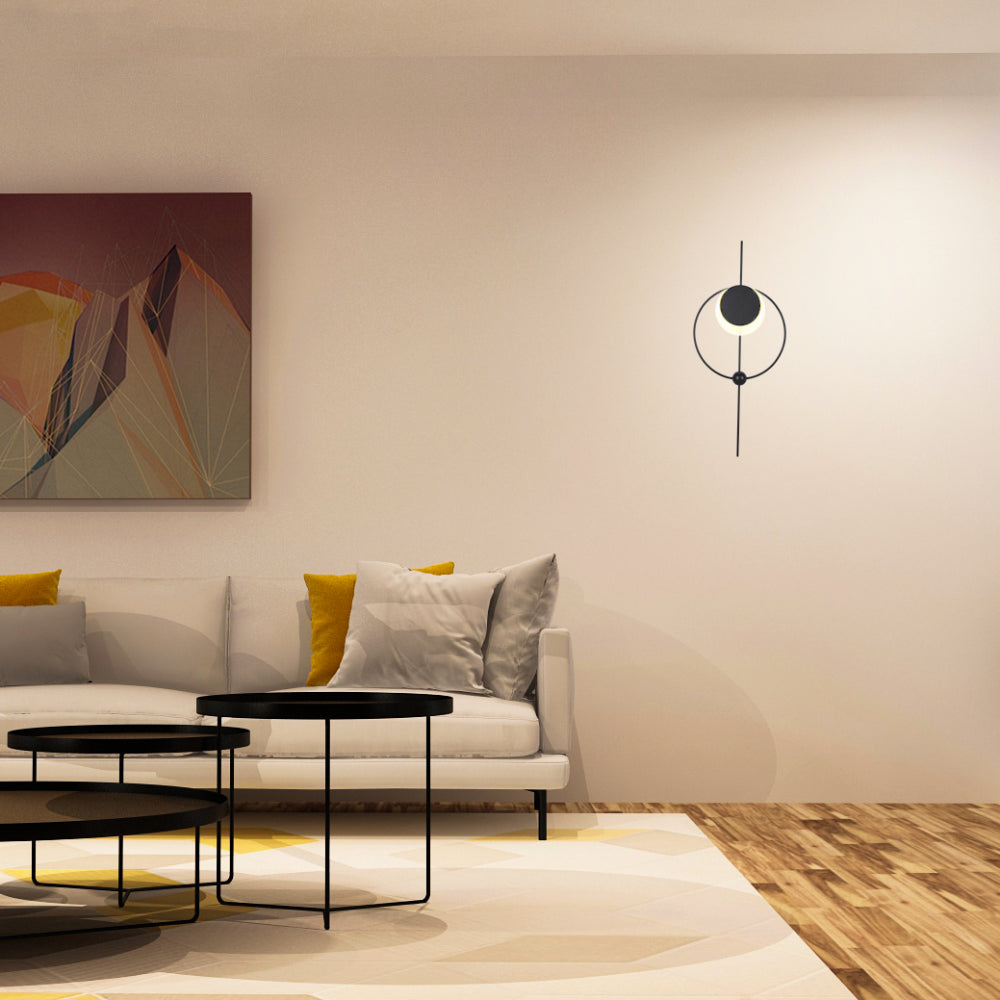 Luz de pared LED geométrica en forma de luna negra, ideal para salas modernas con estilo minimalista.