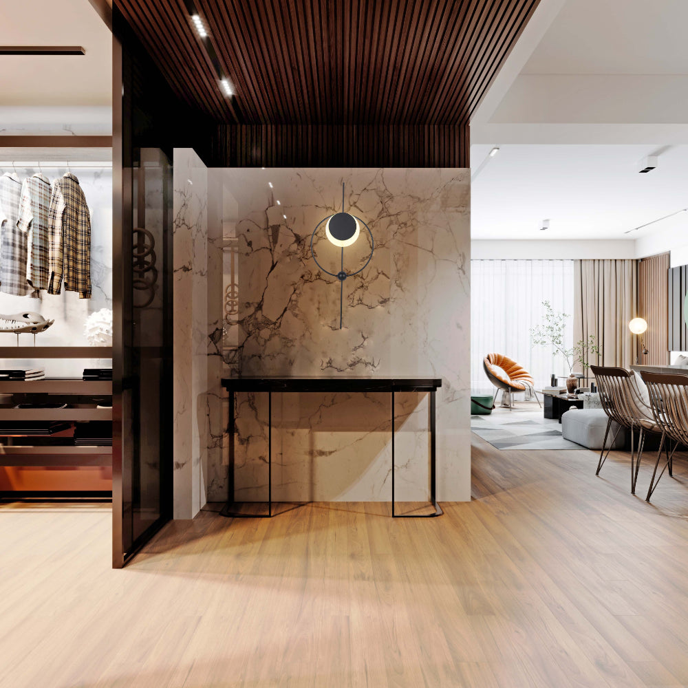 Luz de pared LED moderna en forma de círculo con diseño geométrico, ideal para salas de estar con decoración contemporánea.