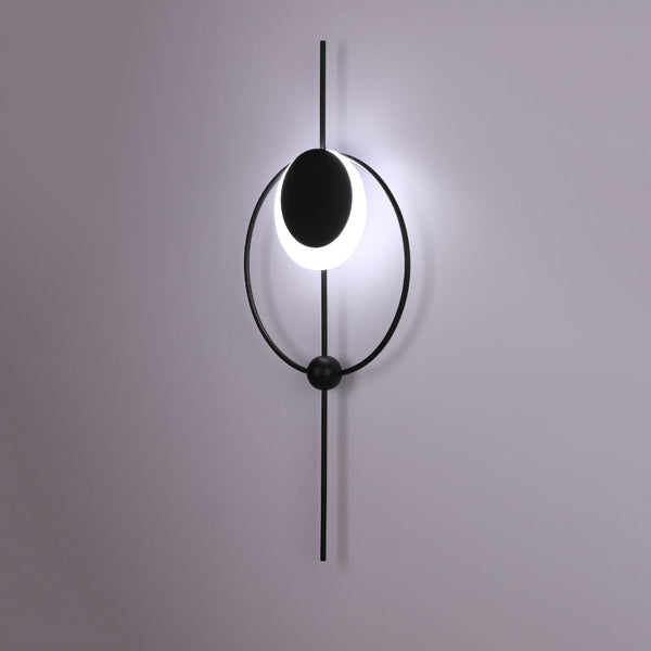 Luz de pared LED moderna con diseño geométrico de luna en círculo, ideal para decoración contemporánea en salones o dormitorios.