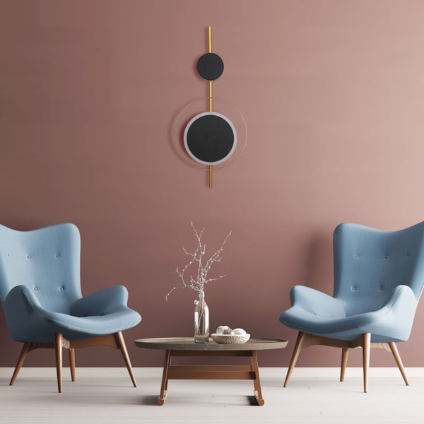 Luz de pared LED moderna en forma geométrica, ideal para decoraciones contemporáneas en salones o pasillos elegantes.