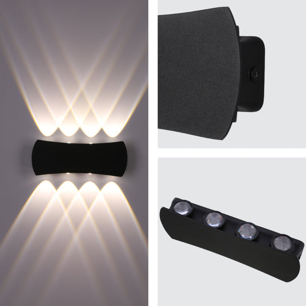 Luz de pared LED moderna y negra para exteriores, ideal para patios y entradas con estilo contemporáneo.