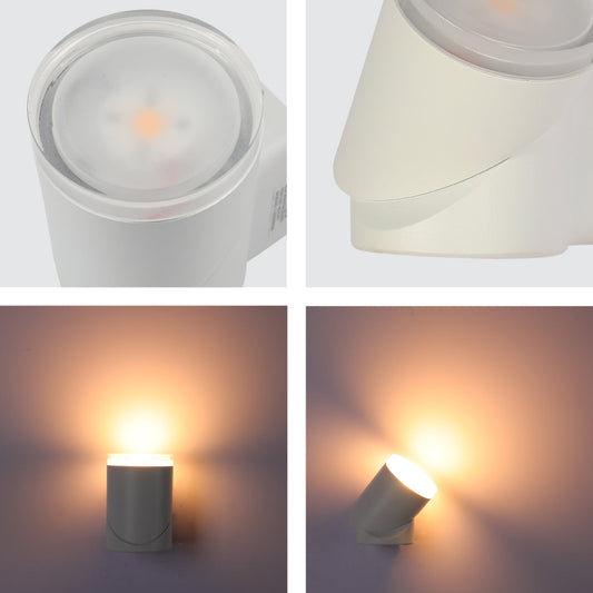 Detalle del aplique de pared LED rotatable, ideal para exteriores, combinando diseño moderno en espacios al aire libre.