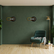 Luz de pared y techo LED Eclipse, diseño negro moderno, ideal para salas de estar o entradas con decoraciones contemporáneas.