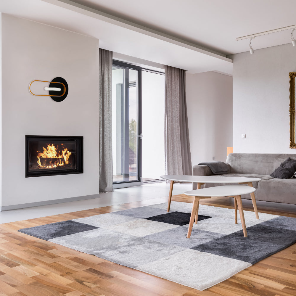 Luz de pared y techo LED Eclipse de diseño moderno en acabado negro, ideal para salones y habitaciones contemporáneas.
