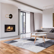 Luz de pared y techo LED Eclipse de diseño moderno en acabado negro, ideal para salones y habitaciones contemporáneas.