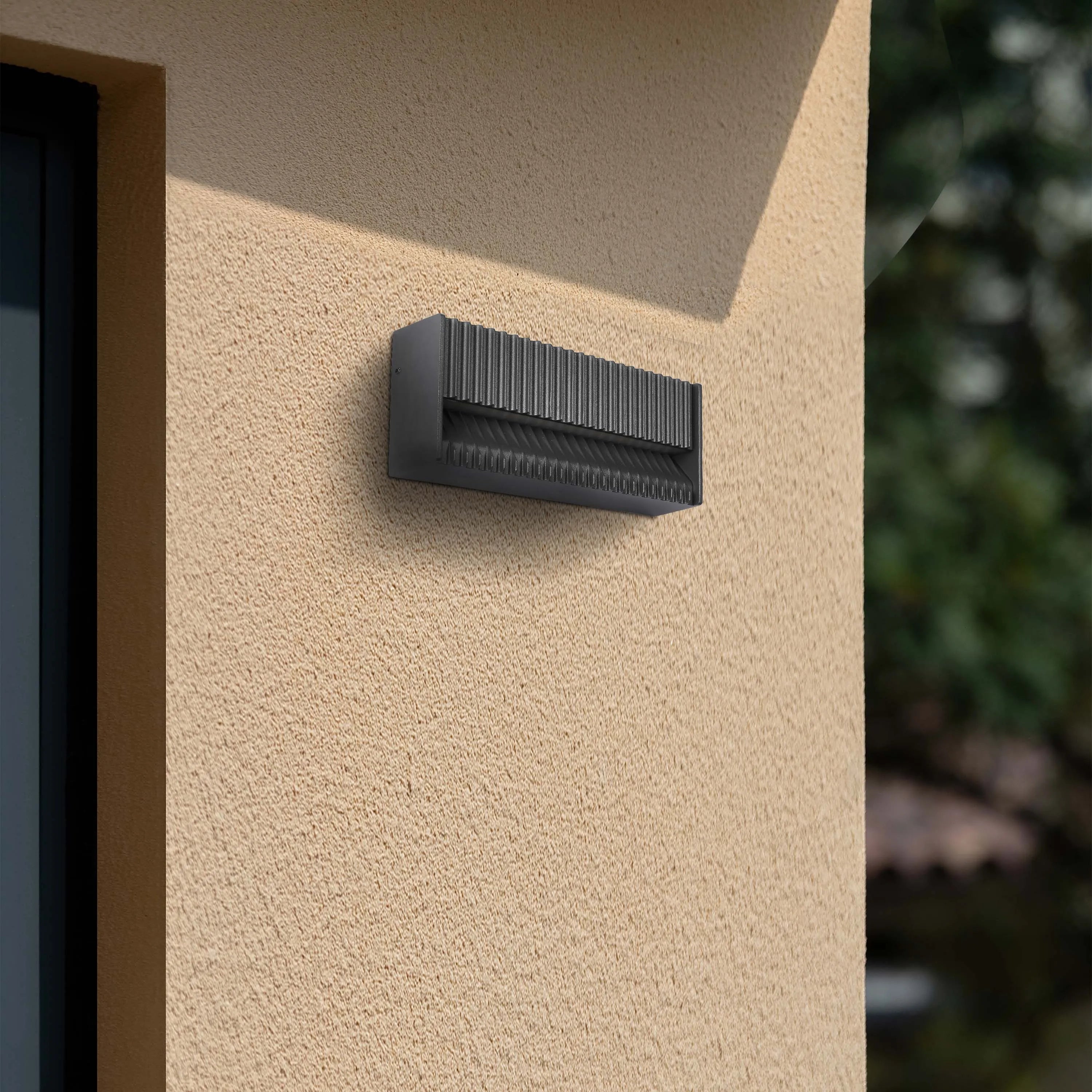 Lámpara de pared rectangular para exterior con protección IP65