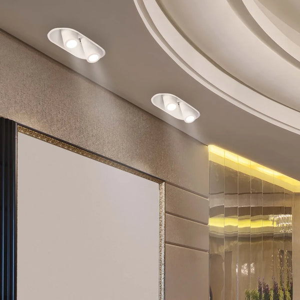 Moderno foco empotrable LED mostrado en una sala de estar elegante y minimalista, realzando la decoración contemporánea con iluminación ajustable.143-03424