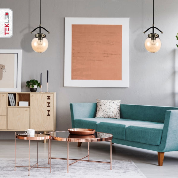 Amber Glass Globe Black And Antique Brass Pendant Light E27 in indoor setting living room waiting room
