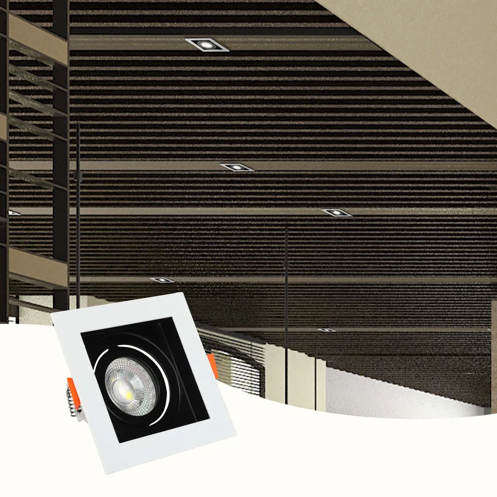 Luminaria empotrable GU10 elegante que realza una cocina moderna con decoración minimalista, proporcionando iluminación focalizada y un toque elegante.143-03440